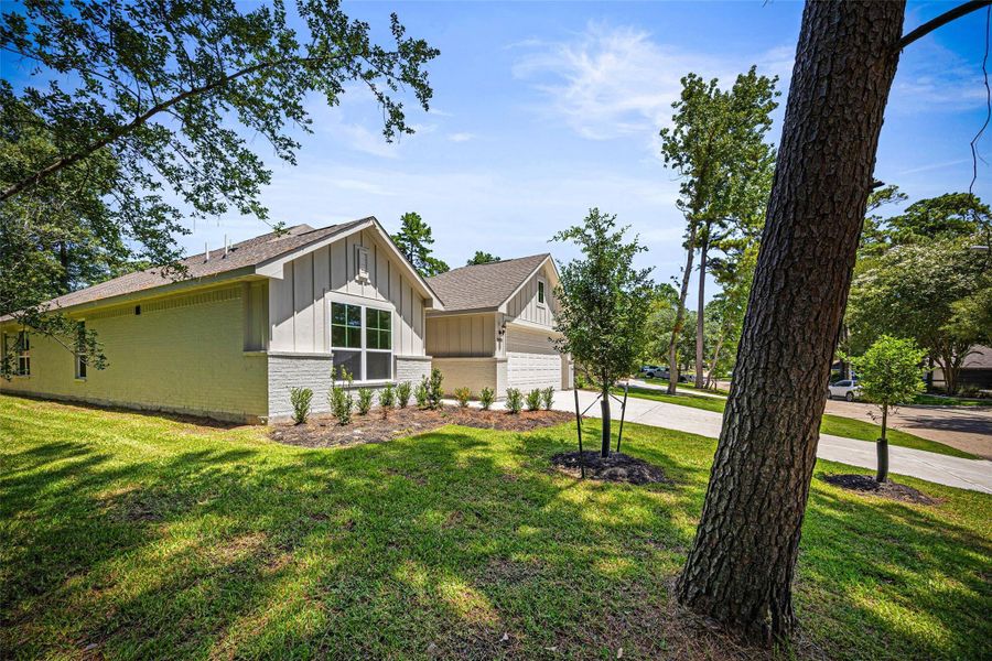 Front exterior of a new home in , Montgomery, TX, highlighting curb appeal (Image 22). Front exterior of a new home in , Montgomery, TX, highlighting curb appeal (Image 22).