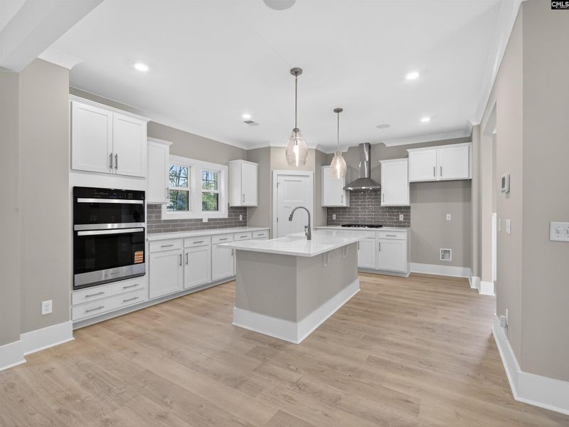 Furnished interior view inside a new home in Collins Cove, Chapin (Image 14).