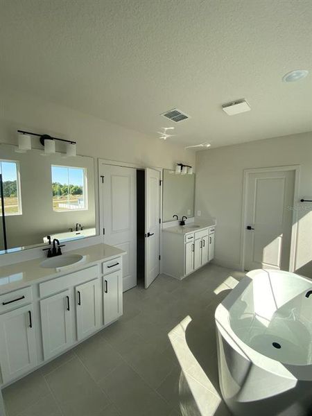 Furnished interior view inside a new home in Summerlake Reserve, Winter Garden (Image 8).