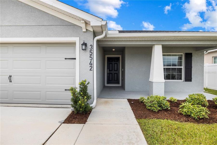 Exterior details and patio area of a home in Stonebridge North, Zephyrhills (Image 26). Exterior details and patio area of a home in Stonebridge North, Zephyrhills (Image 26).