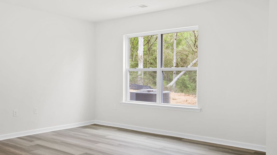 Spacious, unfurnished interior of a new home in Chestnut Ridge Townhomes, Greenville (Image 19).