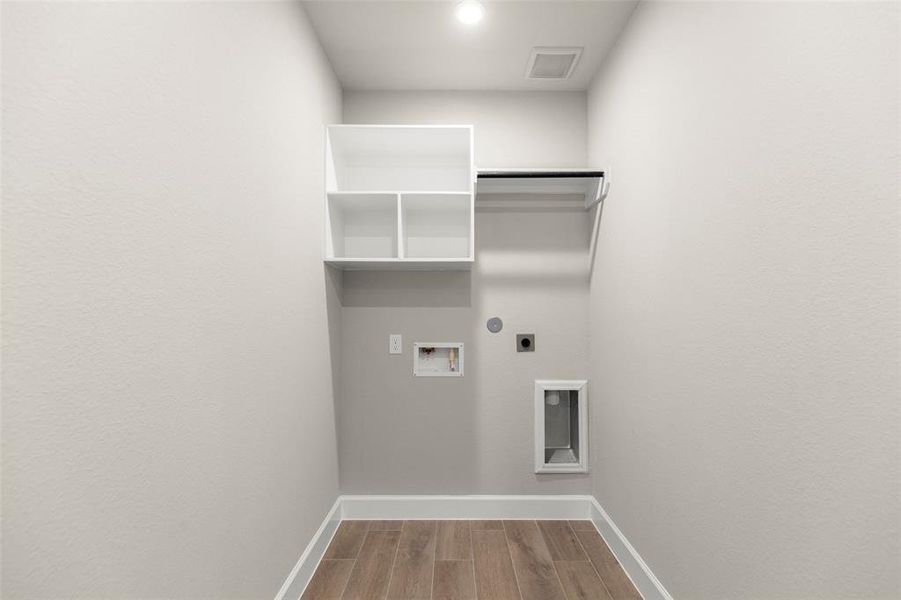 Nice Sized Laundry Room with Shelving for Storage