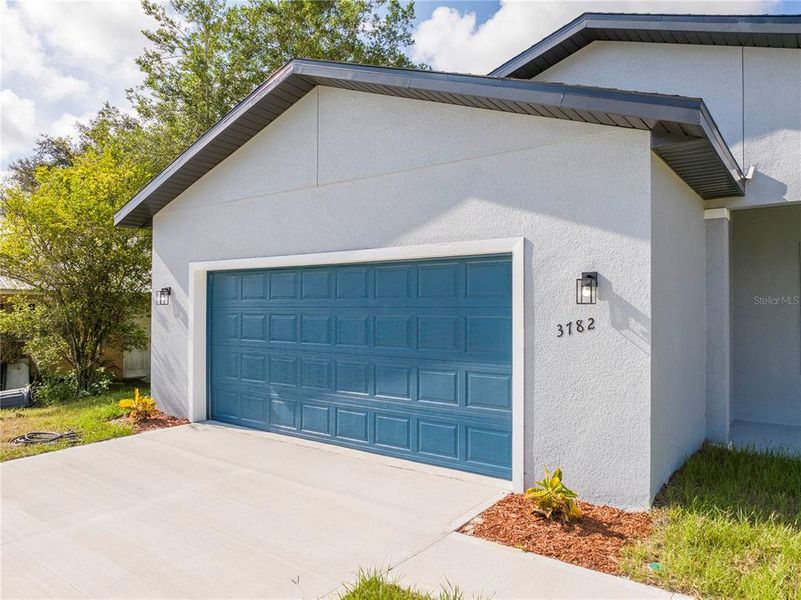 Front exterior of a new home in , Ocala, FL, highlighting curb appeal (Image 26).