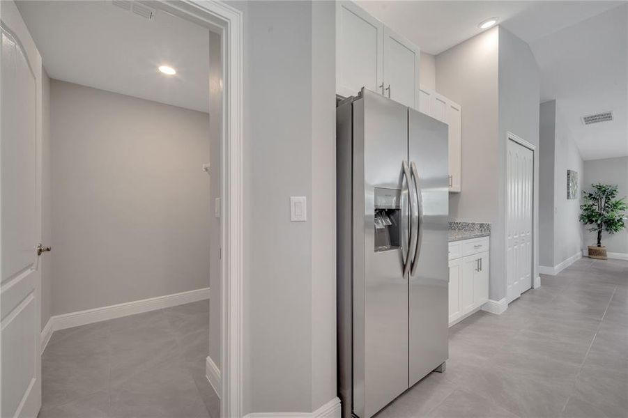 Furnished interior view inside a new home in , Kissimmee (Image 16).