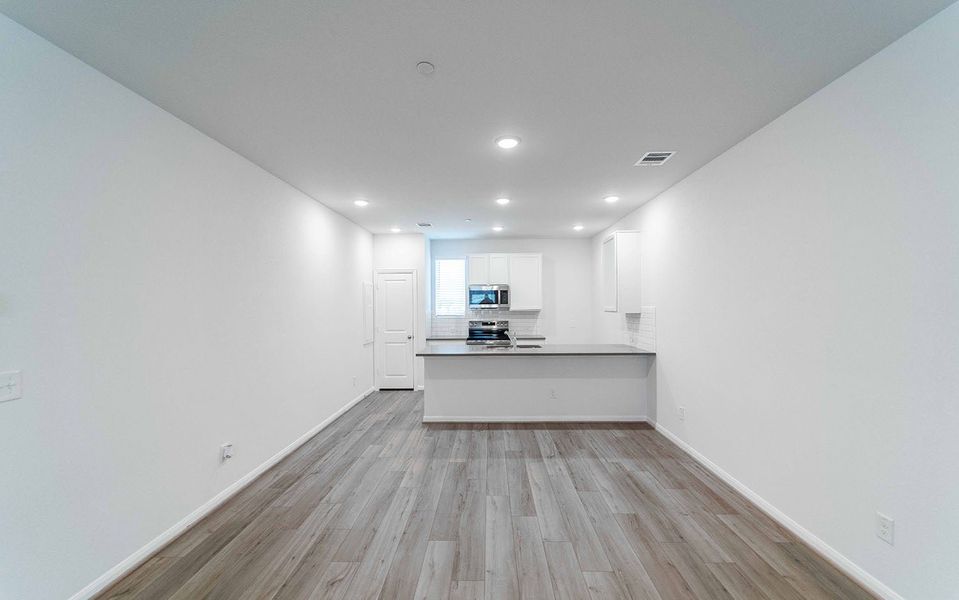 Spacious, unfurnished interior of a new home in Municipal Drive Townhomes, Leander (Image 9). Spacious, unfurnished interior of a new home in Municipal Drive Townhomes, Leander (Image 9).