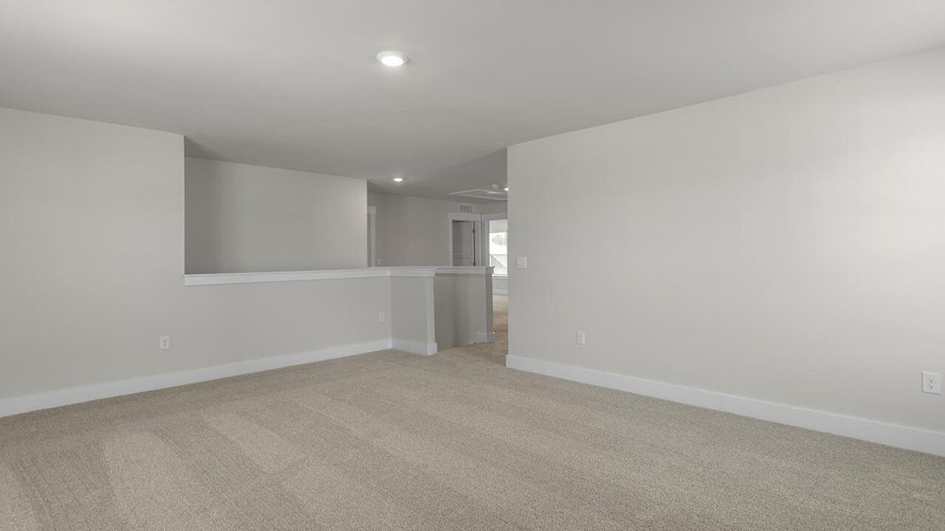 Spacious, unfurnished interior of a new home in Surfside Landing, Hubert (Image 33).