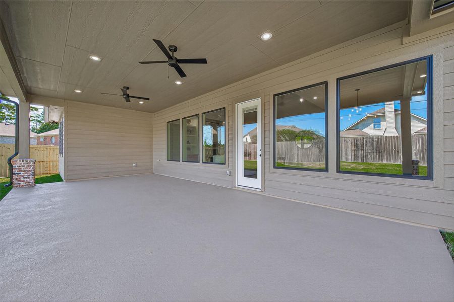 Exterior details and patio area of a home in , Tomball (Image 3).