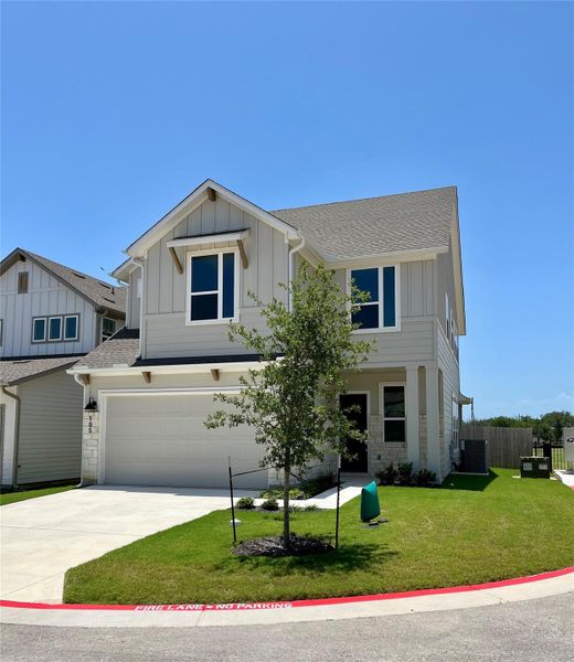 Front exterior of a new home in , Dripping Springs, TX, highlighting curb appeal (Image 2). Front exterior of a new home in , Dripping Springs, TX, highlighting curb appeal (Image 2).