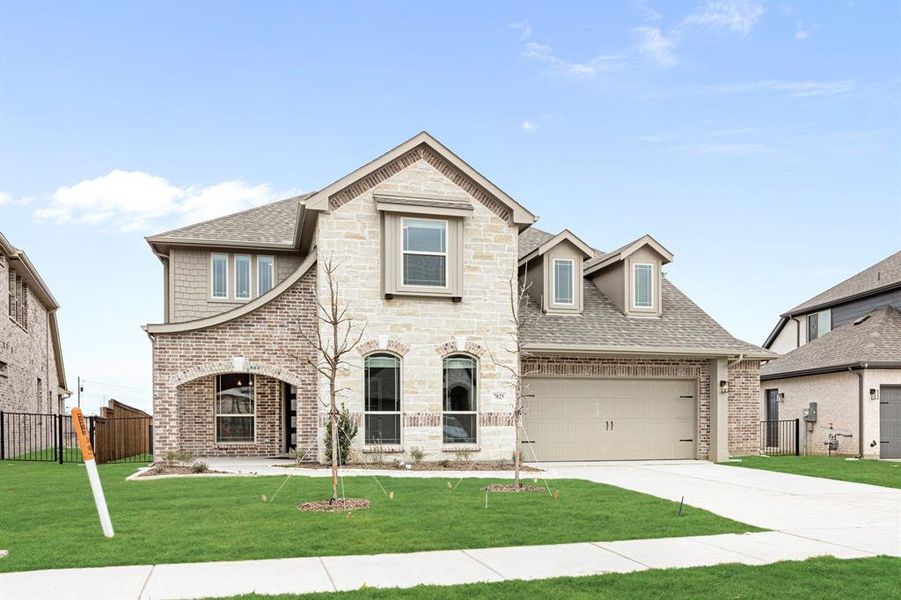 Front exterior of a new home in Silo Mills, Joshua, TX, highlighting curb appeal (Image 2).