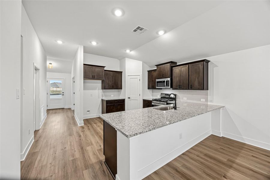 Furnished interior view inside a new home in River Ranch Trails, Dayton (Image 4).