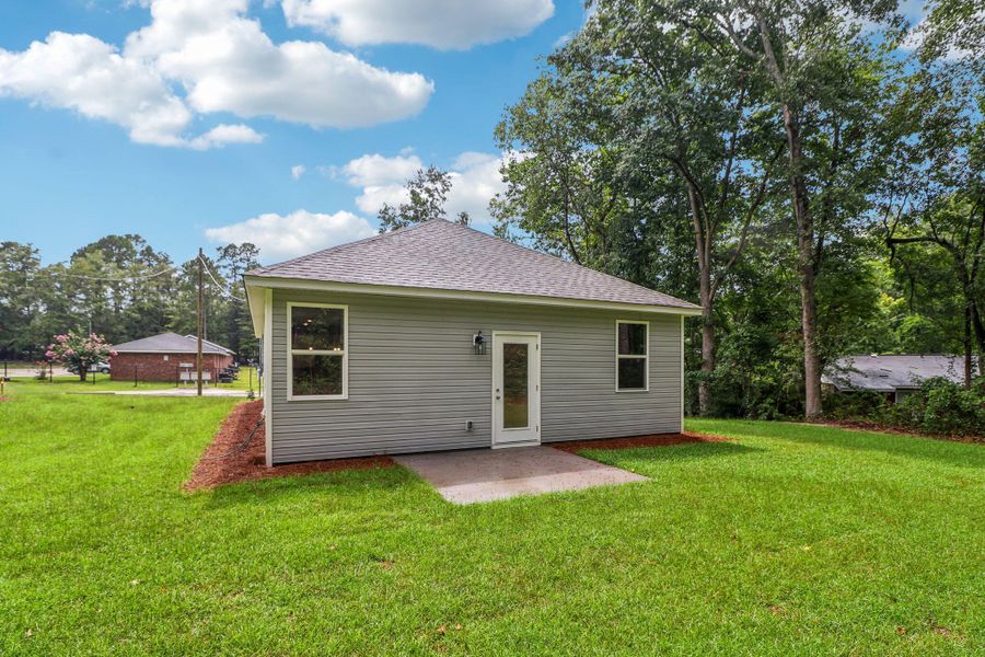 Exterior details and patio area of a home in Founder's Park, Lincolnville (Image 3). Exterior details and patio area of a home in Founder's Park, Lincolnville (Image 3).