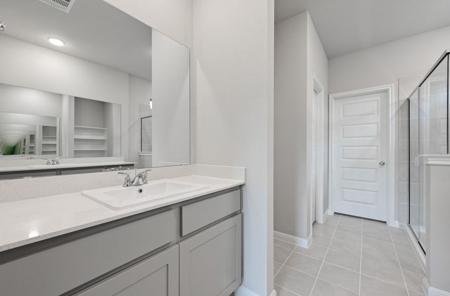 Primary Bath in the Willow home plan by Trophy Signature Homes – REPRESENTATIVE PHOTO Primary Bath in the Willow home plan by Trophy Signature Homes – REPRESENTATIVE PHOTO