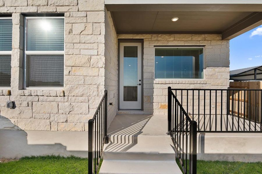 Exterior details and patio area of a home in Union Collection at Park Central, Georgetown (Image 26).