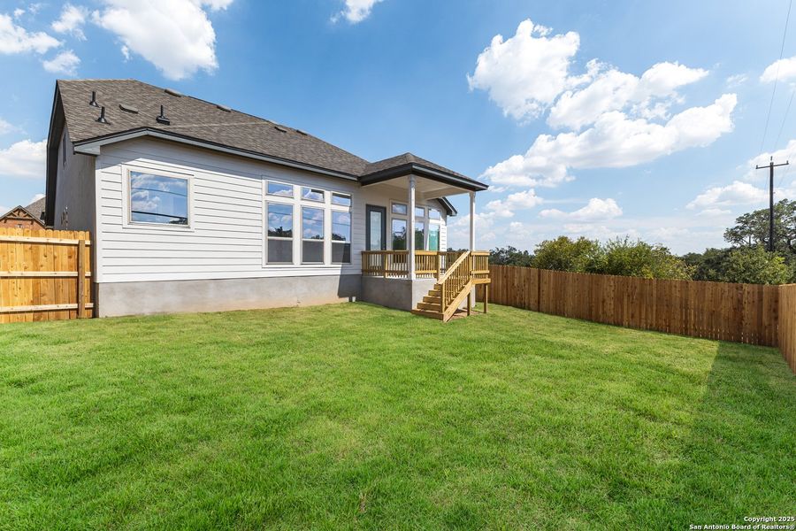 Exterior details and patio area of a home in The Enclave at Potranco Oaks, Castroville (Image 22).