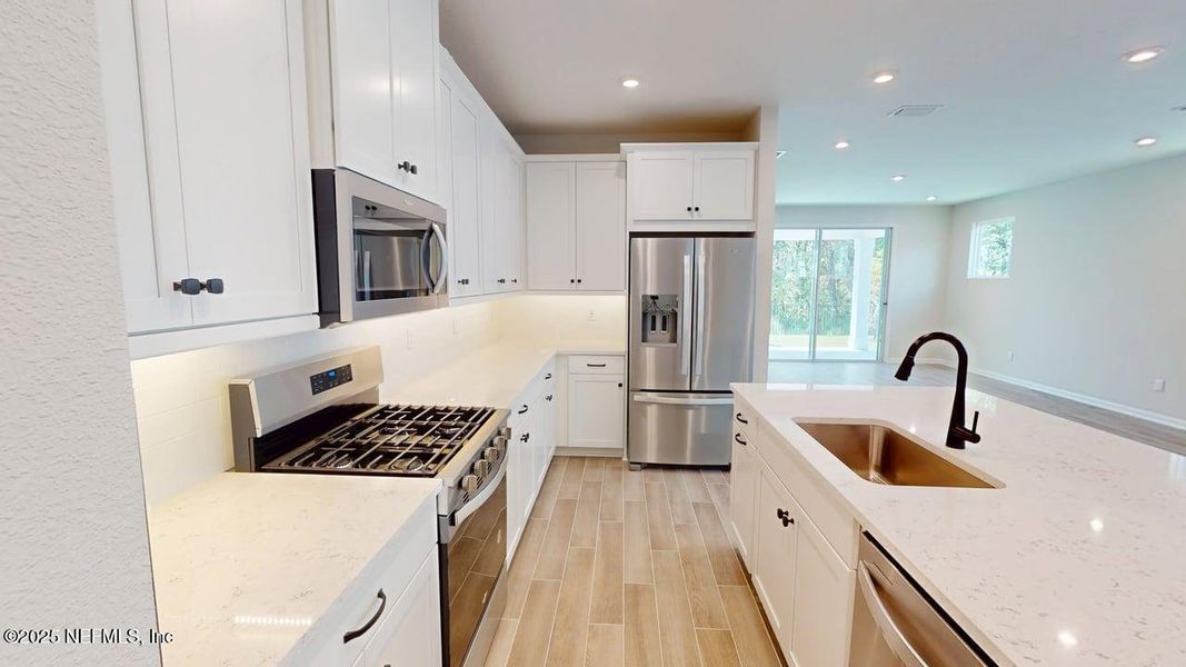 Furnished interior view inside a new home in RiverTown - WaterSong, St. Johns (Image 6). Furnished interior view inside a new home in RiverTown - WaterSong, St. Johns (Image 6).