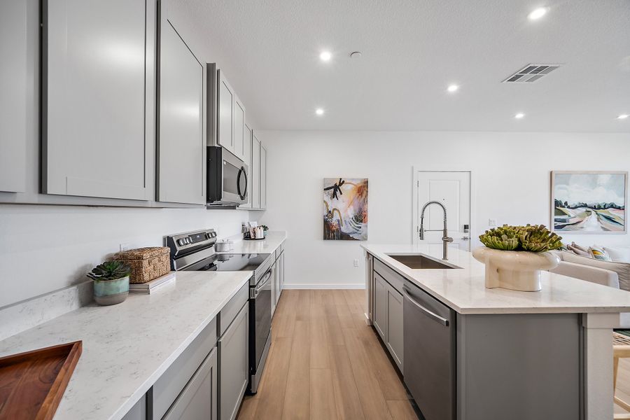 Furnished interior view inside a new home in Lyric at RidgeGate Condos, Lone Tree (Image 8).