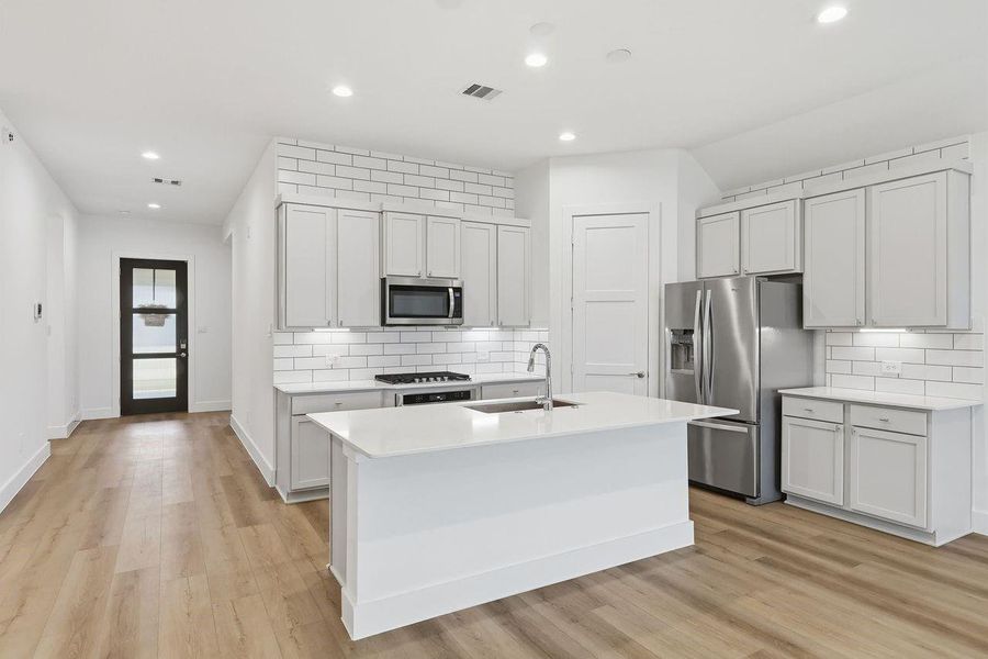 Furnished interior view inside a new home in Hills of Westlake, Conroe (Image 5).