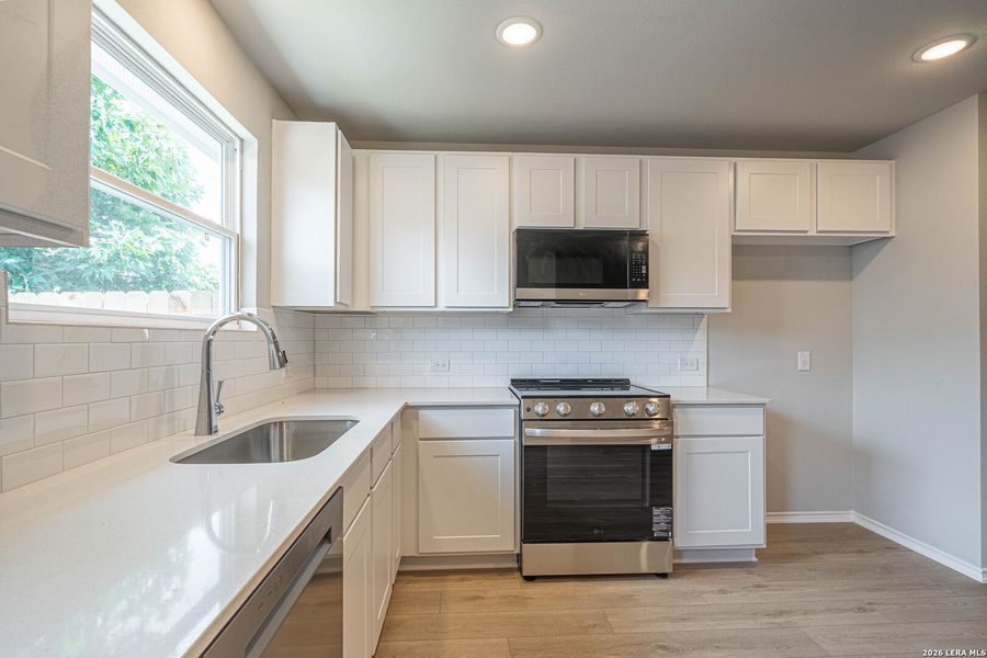 Furnished interior view inside a new home in , Seguin (Image 7).