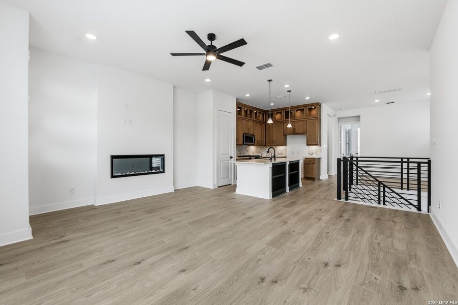 Spacious, unfurnished interior of a new home in Centero at Stone Oak, San Antonio (Image 19).