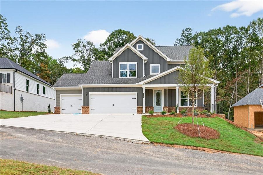 Front exterior of a new home in The Manor at Gainesville Township, Gainesville, GA, highlighting curb appeal (Image 2).