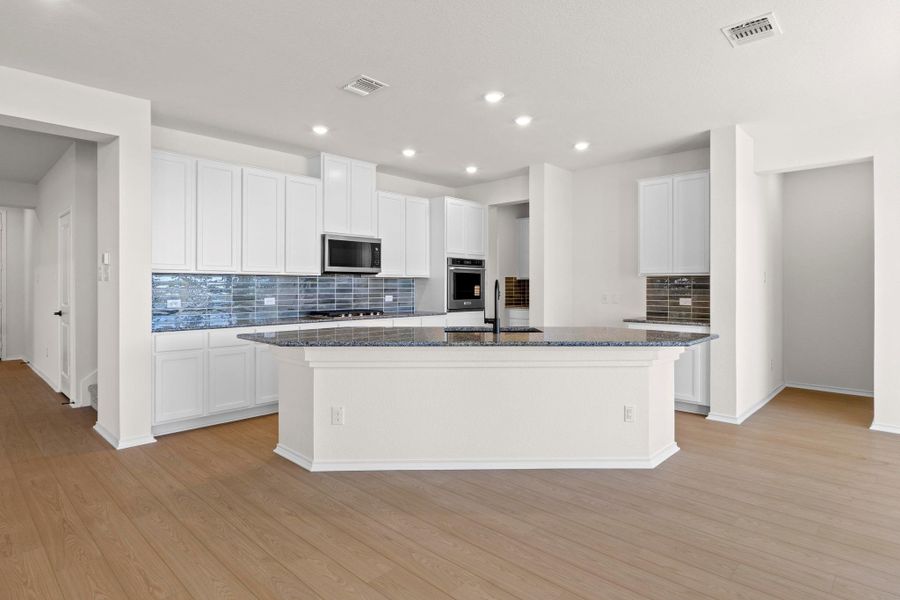 Furnished interior view inside a new home in Salerno - Classic Collection, Round Rock (Image 13).