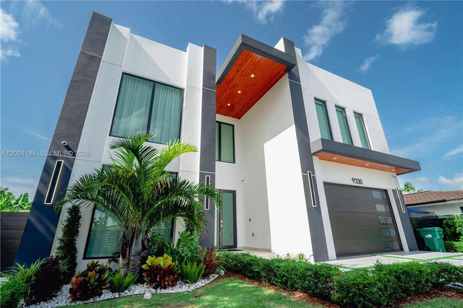 Front exterior of a new home in , Miami, FL, highlighting curb appeal (Image 31). Front exterior of a new home in , Miami, FL, highlighting curb appeal (Image 31).