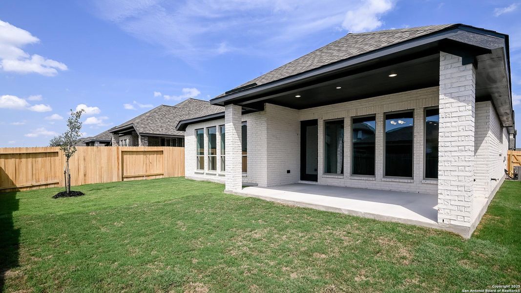 Exterior details and patio area of a home in Meadows Of Mill Creek 50', Seguin (Image 4).