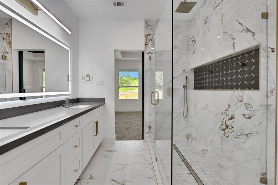 Beautiful and spacious walk in shower with tile detail