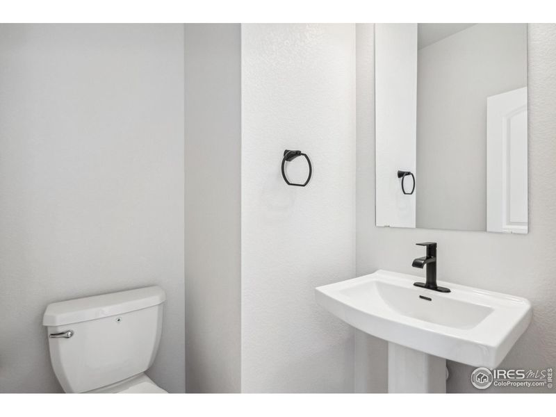 Furnished interior view inside a new home in Kinston Mainstreet Townhomes, Loveland (Image 6).