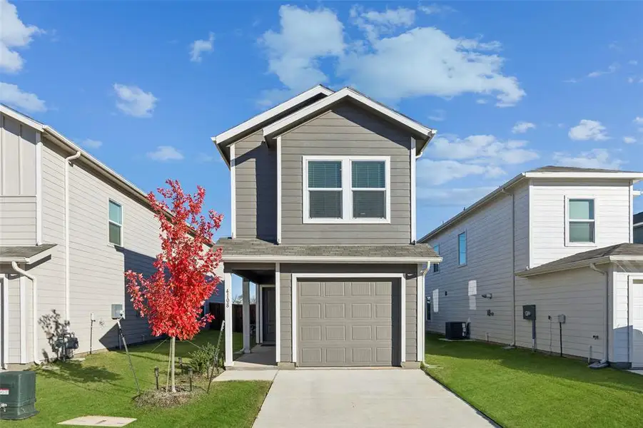 Front exterior of a new home in Foree Ranch: Wellton Collection, Providence Village, TX, highlighting curb appeal (Image 2). Front exterior of a new home in Foree Ranch: Wellton Collection, Providence Village, TX, highlighting curb appeal (Image 2).