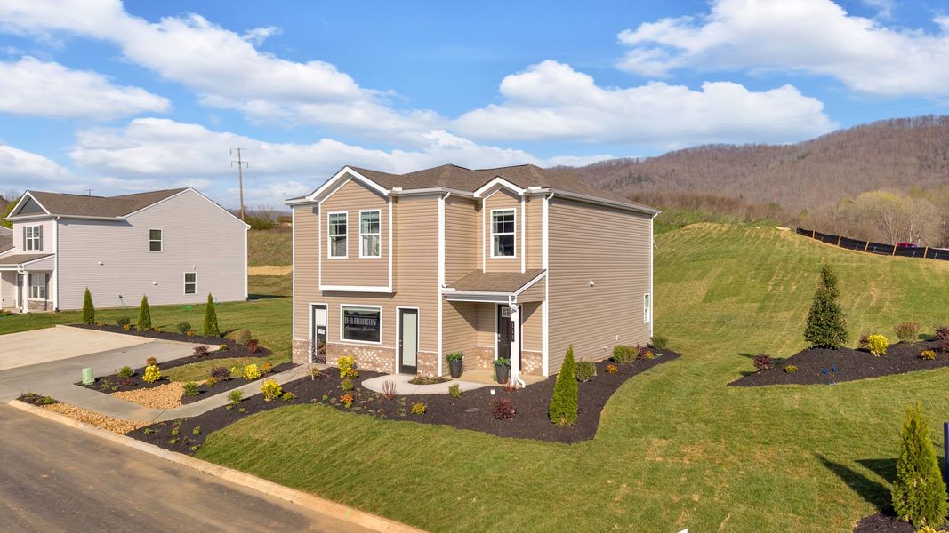Front exterior of a new home in Emory Creek, Harriman, TN, highlighting curb appeal (Image 25).