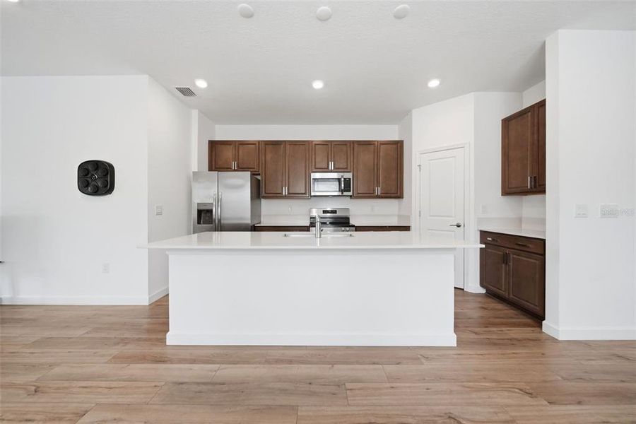 Furnished interior view inside a new home in The Timbers at Everlands, Palm Bay (Image 9).