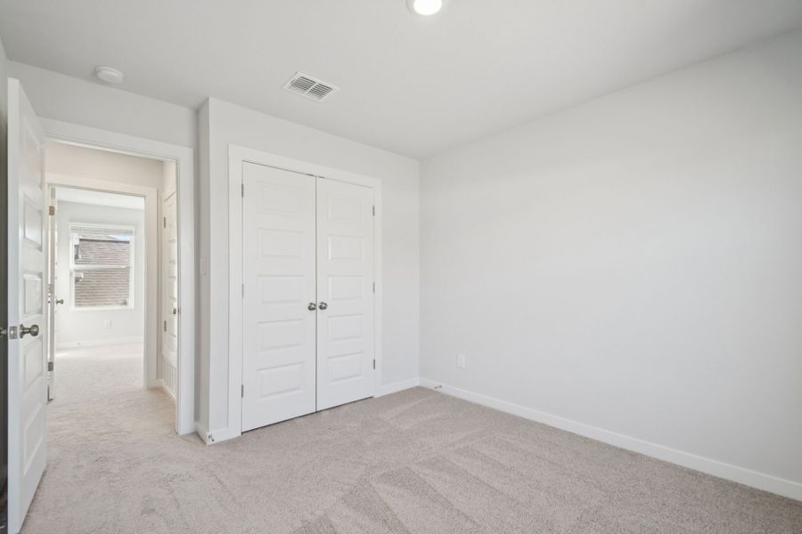 A room with white doors.