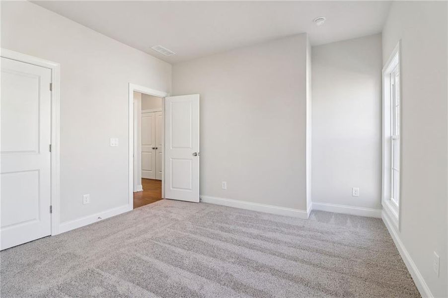 Spacious, unfurnished interior of a new home in Brackley Single Family, Cumming (Image 47). Spacious, unfurnished interior of a new home in Brackley Single Family, Cumming (Image 47).