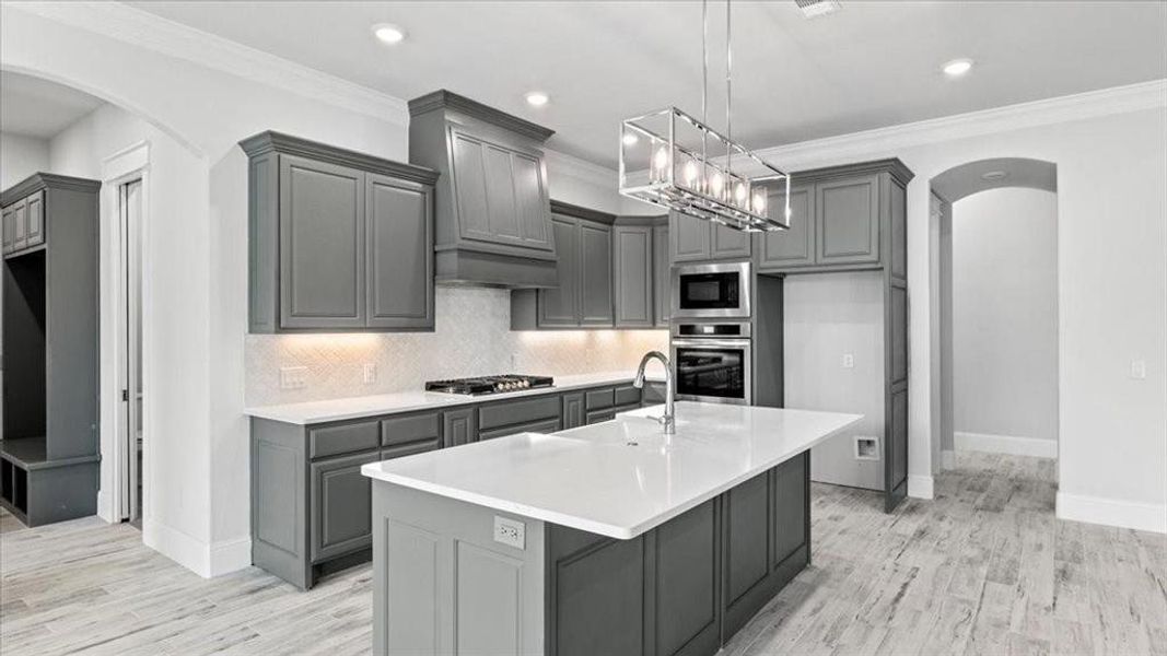 This is a standard kitchen except for the gas stove. The house is all electric, but propane and a gas stove can be added.