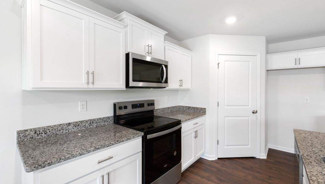 Furnished interior view inside a new home in Lakestone, Woodruff (Image 10).