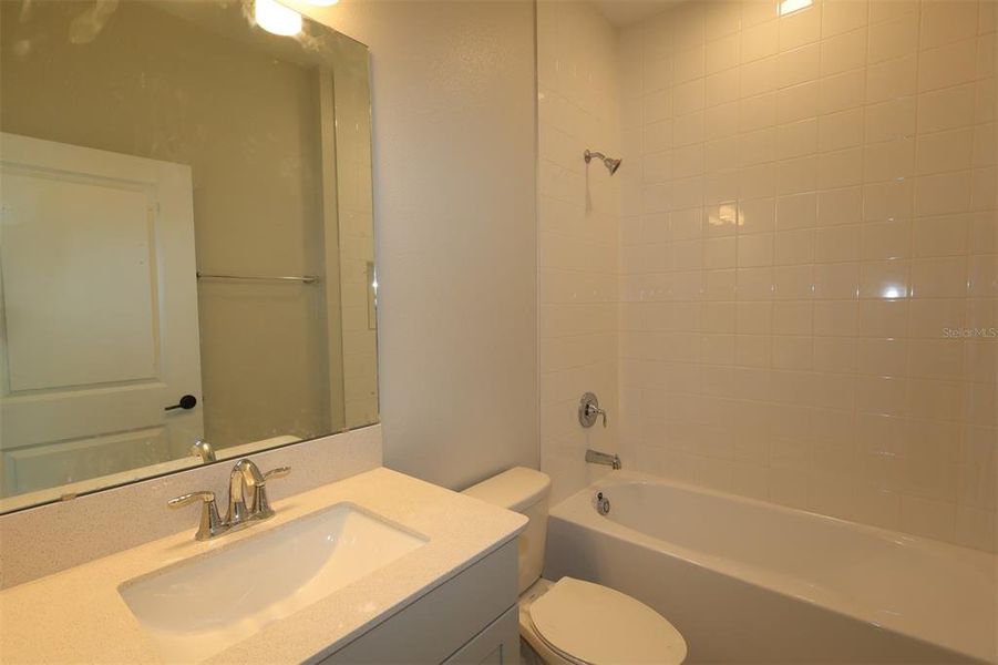 Furnished interior view inside a new home in Center Lake on the Park, St. Cloud (Image 9).