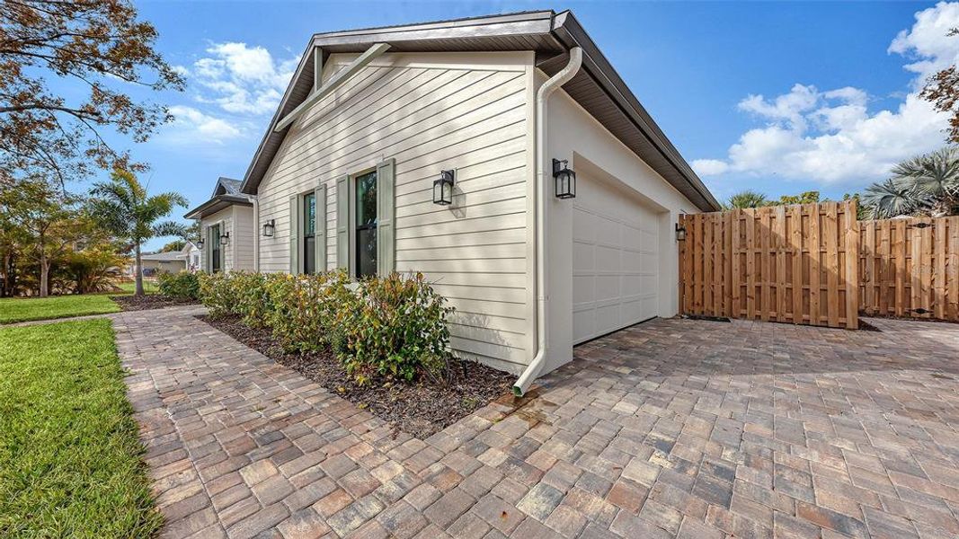 Exterior details and patio area of a home in , Sarasota (Image 25).