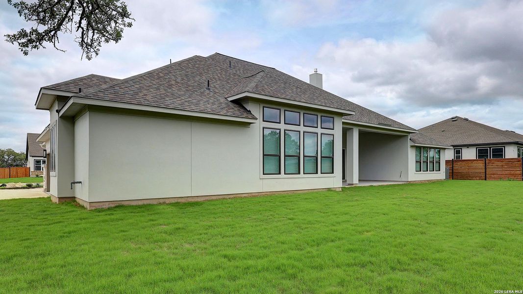 Exterior details and patio area of a home in Megan's Landing, Castroville (Image 24).