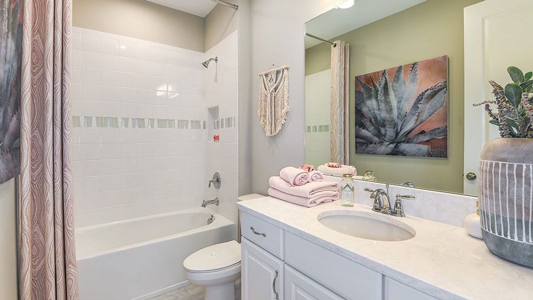 Representative furnished interior of a home built from the Newberry by Taylor Morrison in Harvest at Ovation, Winter Garden (Image 12).