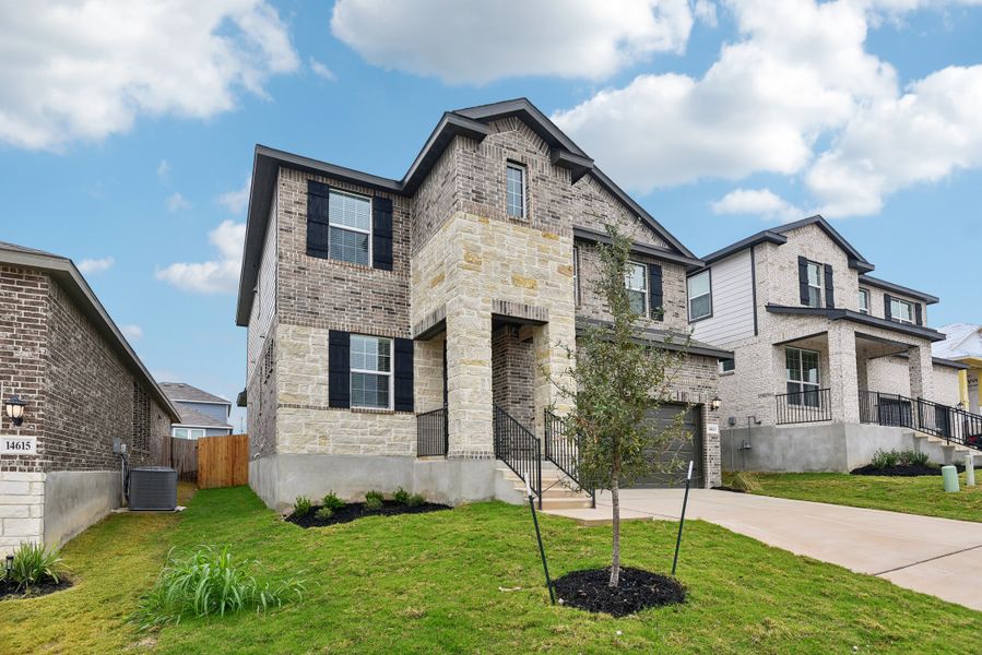 Front exterior of the Red River floorplan at a Meritage Homes community.