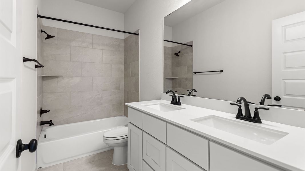 Furnished interior view inside a new home in Meridiana, Manvel (Image 7).