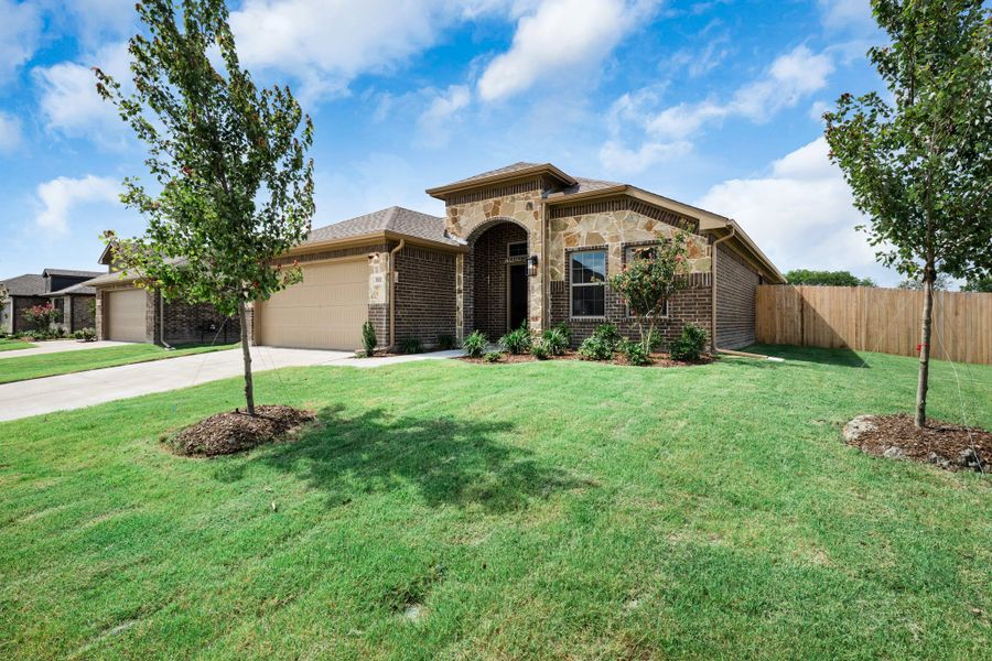 Front exterior of a new home in Fox Landing, Caddo Mills, TX, highlighting curb appeal (Image 18).