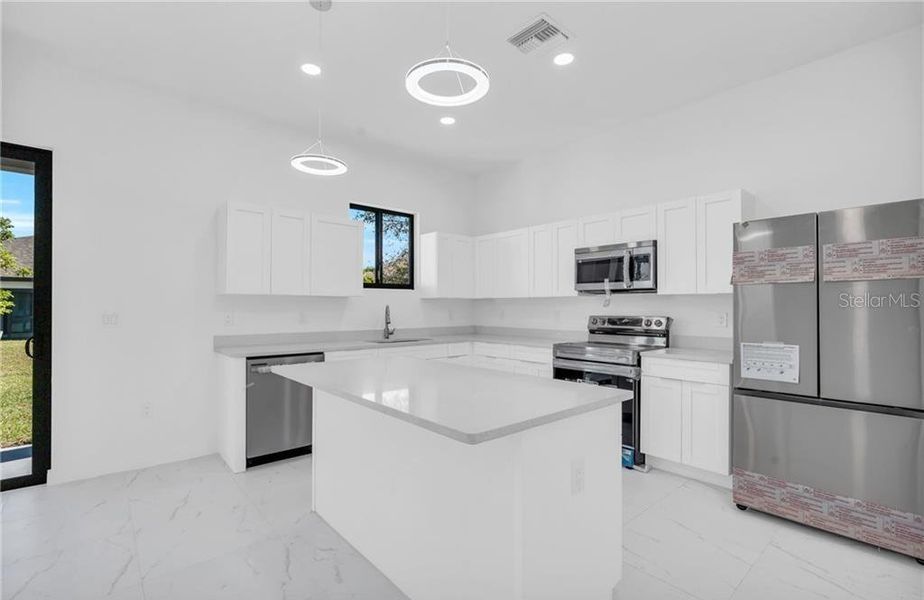 Furnished interior view inside a new home in , Cape Coral (Image 6).
