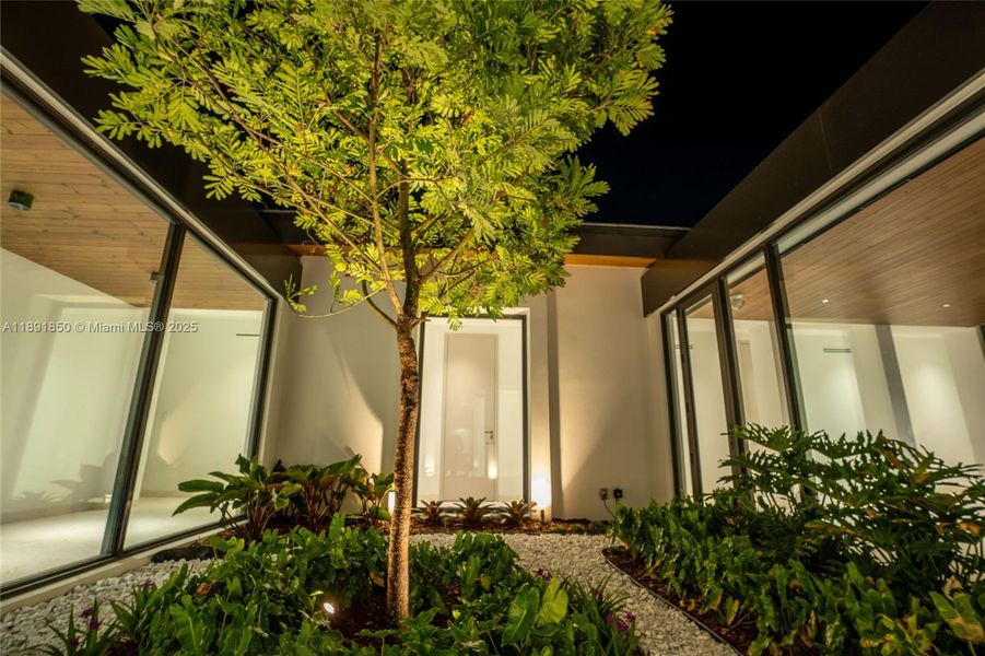 Exterior details and patio area of a home in , Coral Gables (Image 20).
