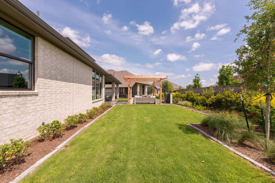 Representative exterior details of a home built from the Camden by Tri Pointe Homes in Bridgeland, Cypress (Image 32).