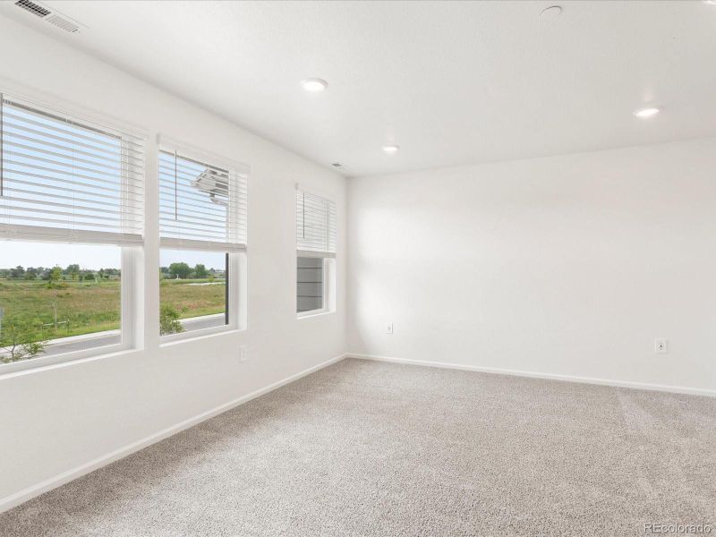 Spacious, unfurnished interior of a new home in Poudre Heights: The Meadow Collection, Windsor (Image 31).