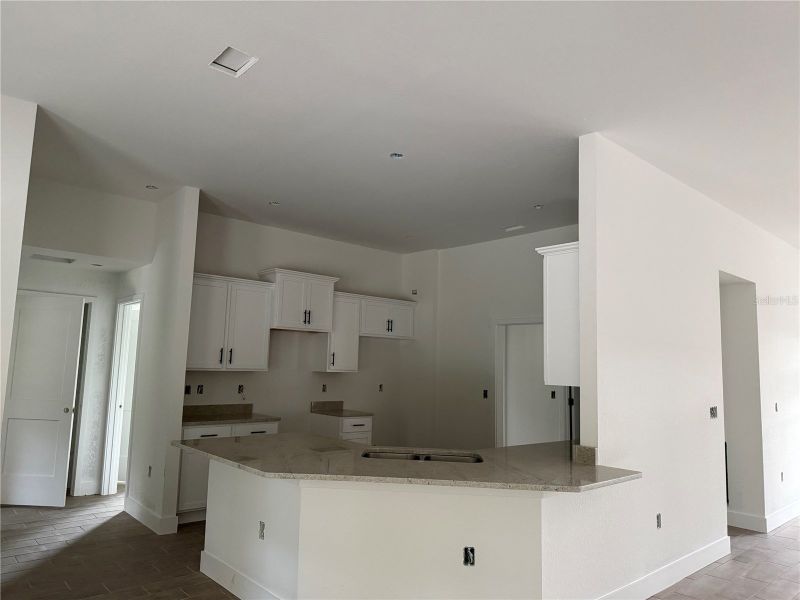 In-progress construction of a new home in North Port, North Port, FL (Image 36).