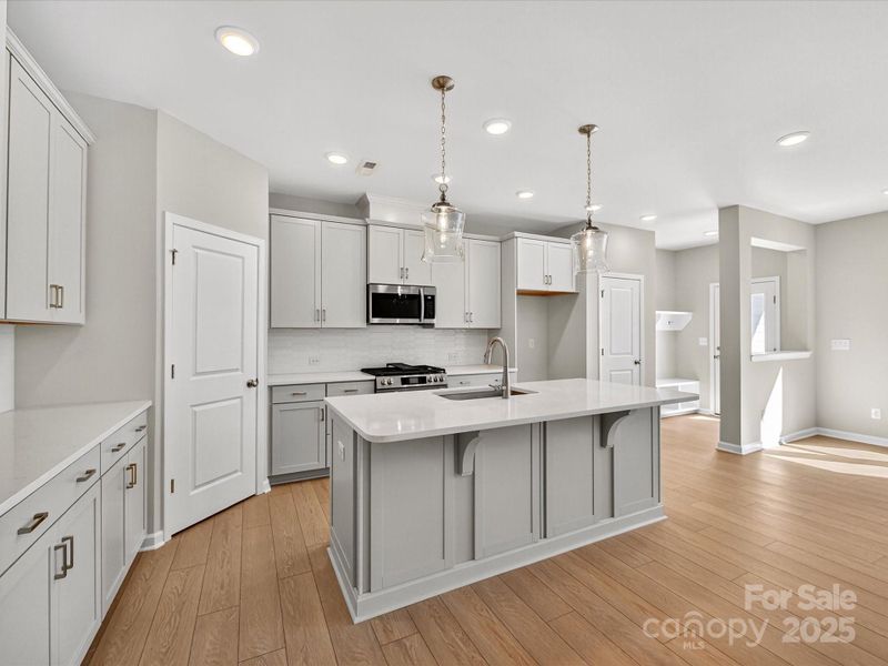 Furnished interior view inside a new home in North Creek Village - Townhomes, Huntersville (Image 5).