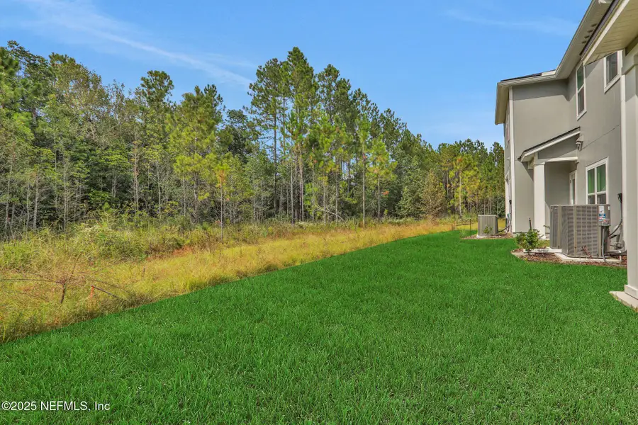 Exterior details and patio area of a home in , Middleburg (Image 3).